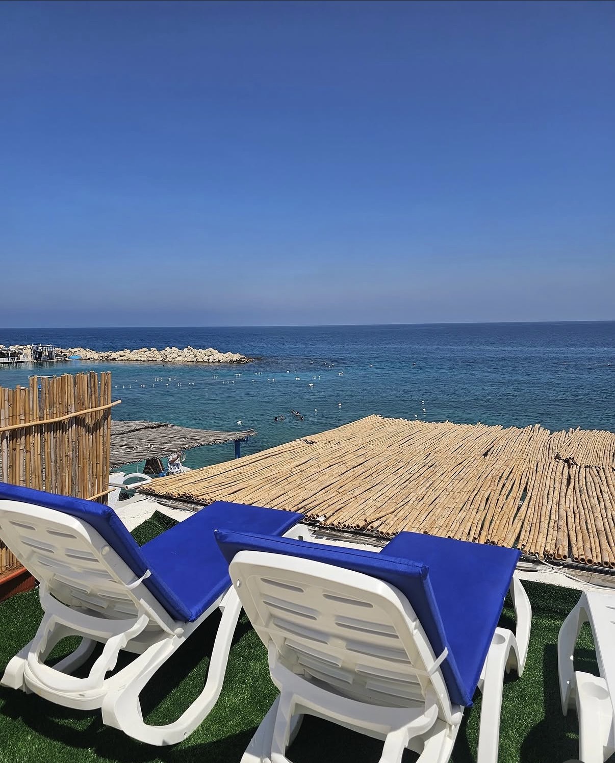 Sun loungers overlooking the Mediterranean Sea